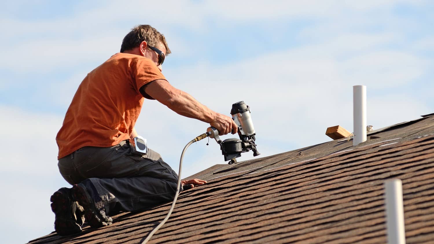 A close-up view of a newly installed roof with shingles, showcasing the craftsmanship and durability of the roofing material.