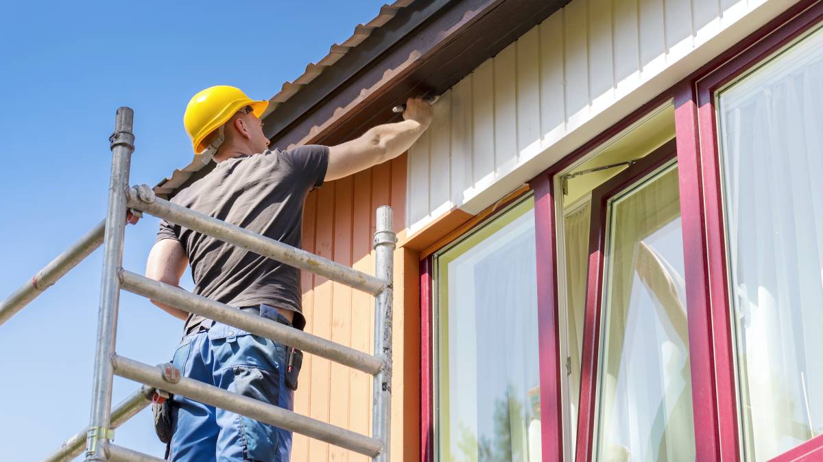 repainting home exterior with white paint