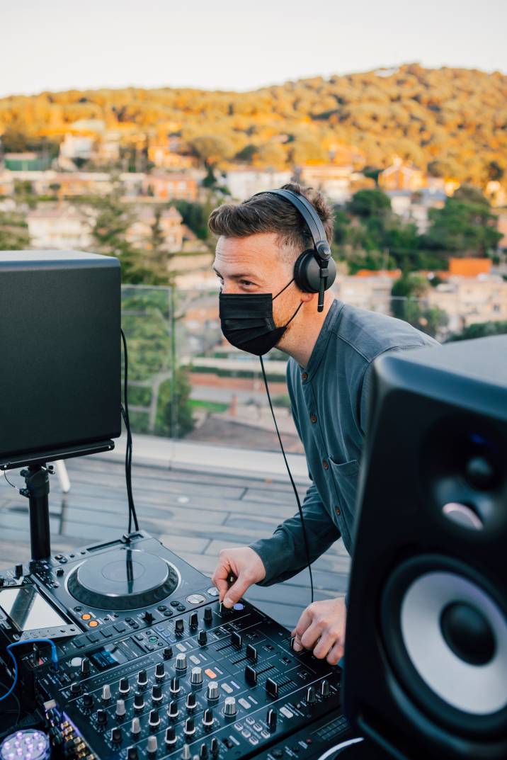 a male DJ working outdoors