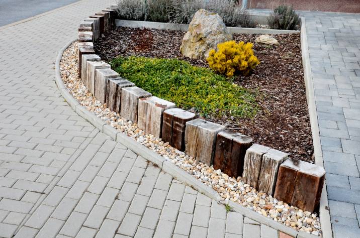 vertical garden edging made from recycled sleepers