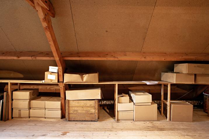 a clean attic with many boxes