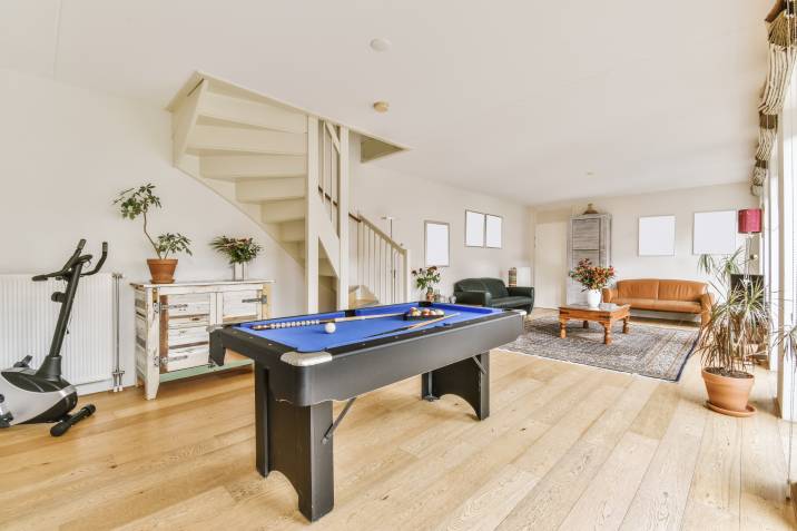 small pool table in a living room