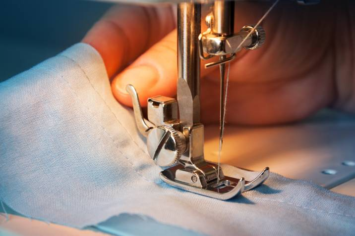fabric sewn under a sewing machine