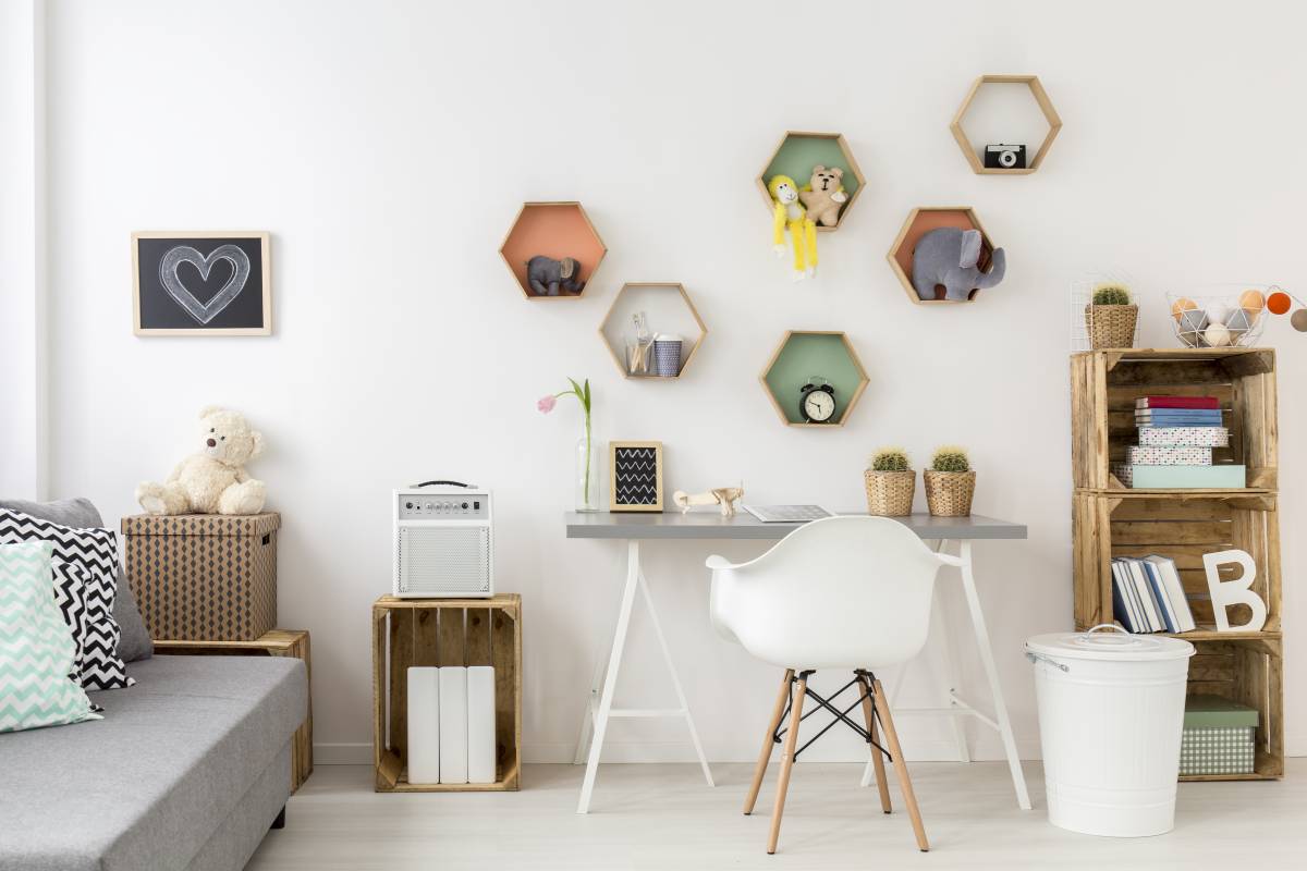 a home office with small hexagonal shelves