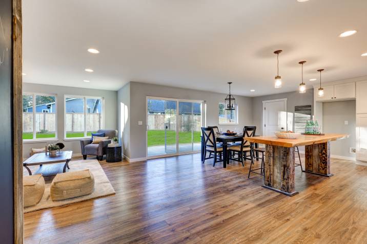 Open-plan kitchen with sliding door