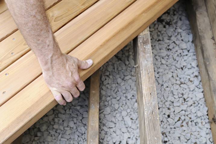 a man completing a decking project