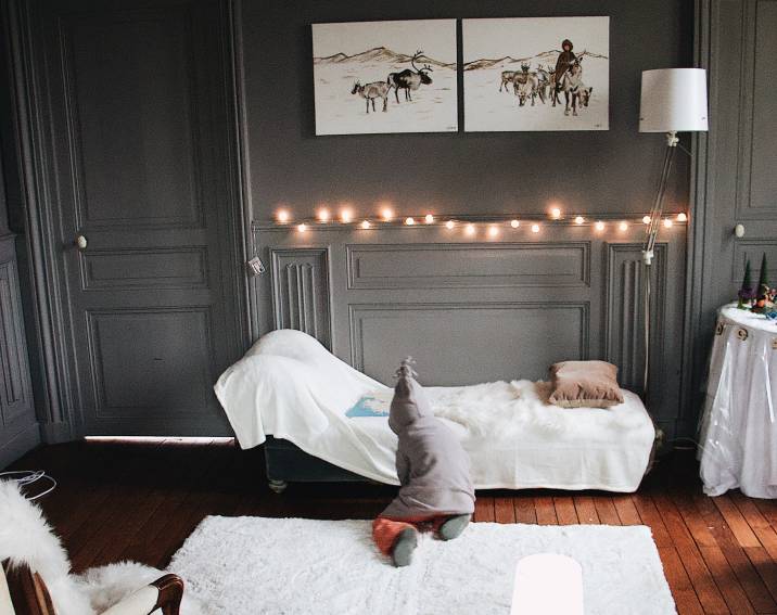 Unused fireplace transformed in bedroom