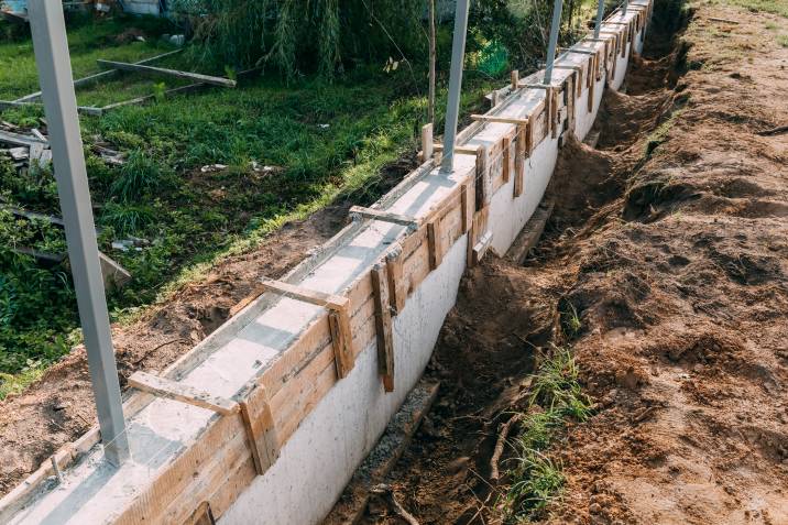 an incomplete garden retaining wall