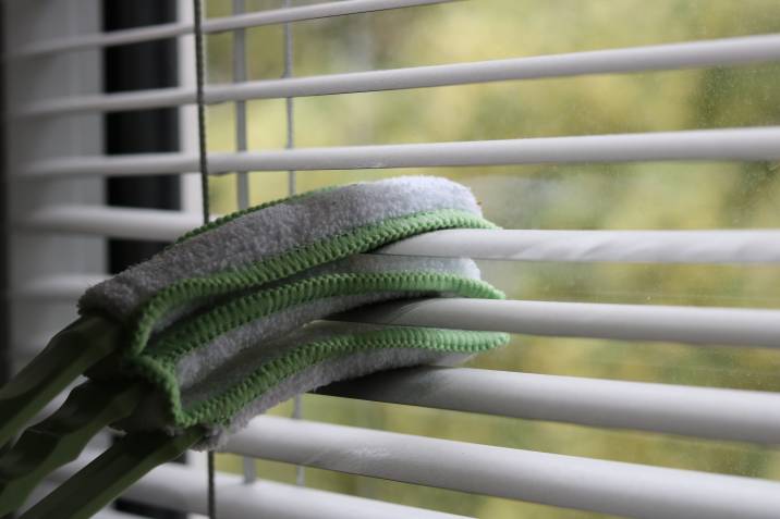 Cleaning with a blinds cleaner brush