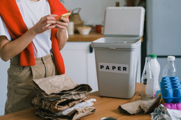 student preparing for rubbish removal