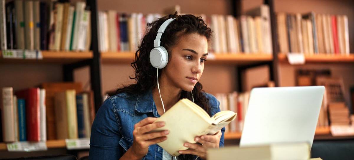 student checking her schedule