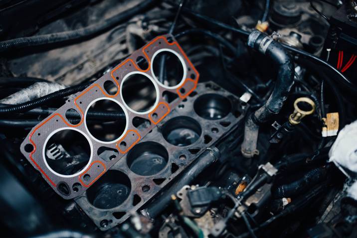 checking a cylinder head gasket in the car engine
