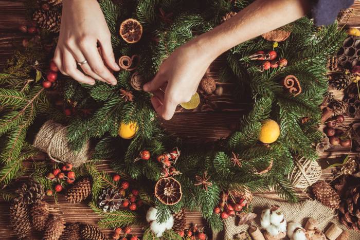 decorating a wreath for Christmas