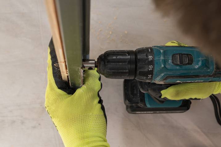 drilling a hole in a door for pet door