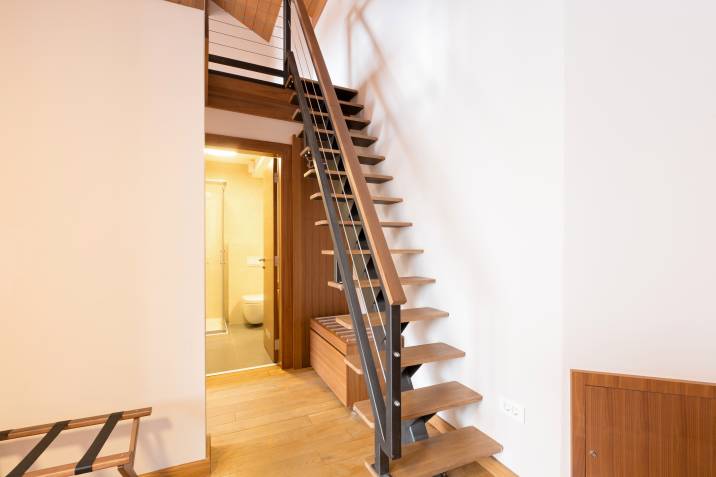 steep attic stairs with strong railing