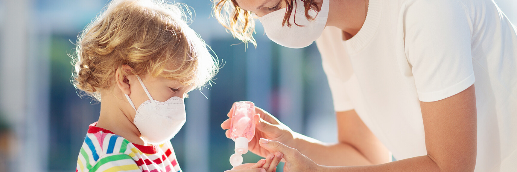 A happy child playing with colorful toys in a bright and inviting childcare center.