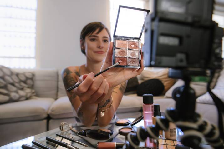 makeup vlogger filming a video
