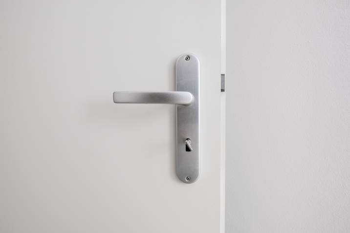 steel privacy door knob on a white door