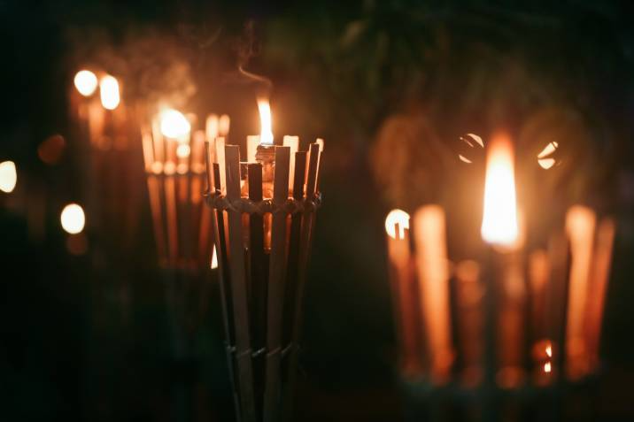 torch lighting in an outdoor garden