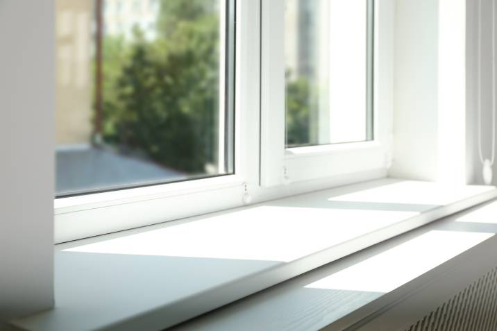 closeup view of beautiful white window with clean, empty sill