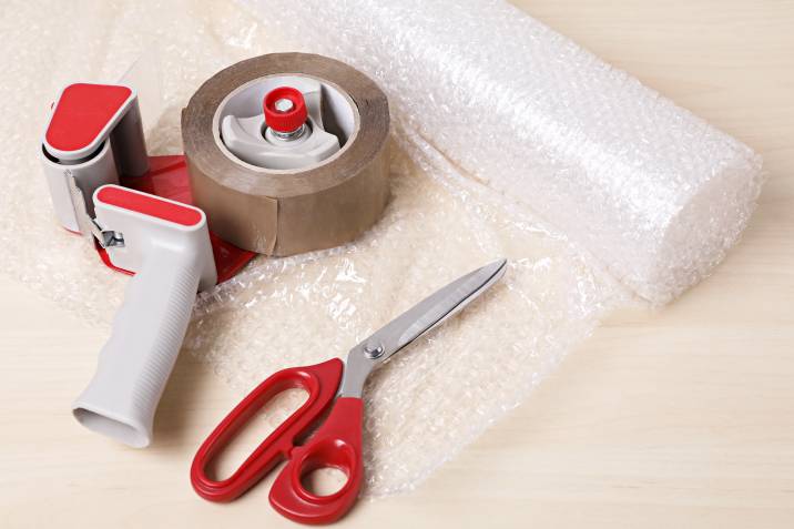 scissors, packing tape, and bubble wrap