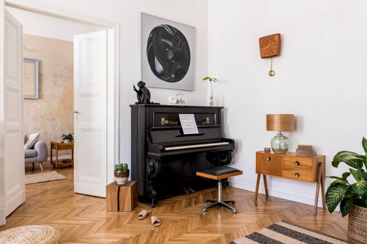 a beautiful black piano at home