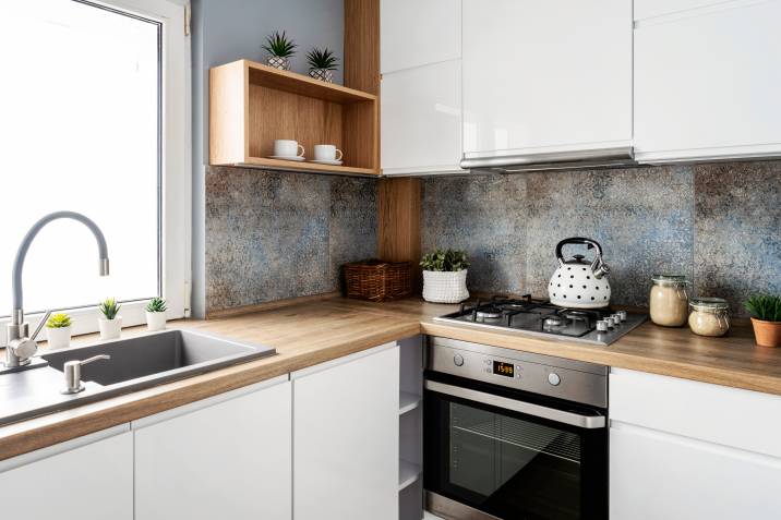 sleek modern white and wood kitchen