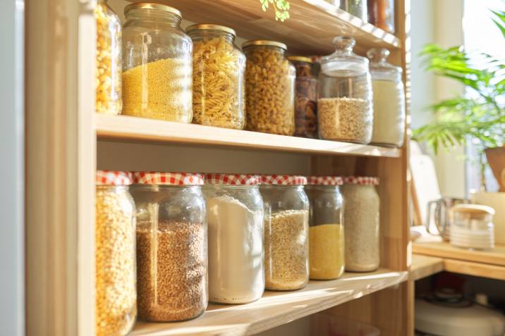 kitchen pantry jars stacked neatly on a shelf