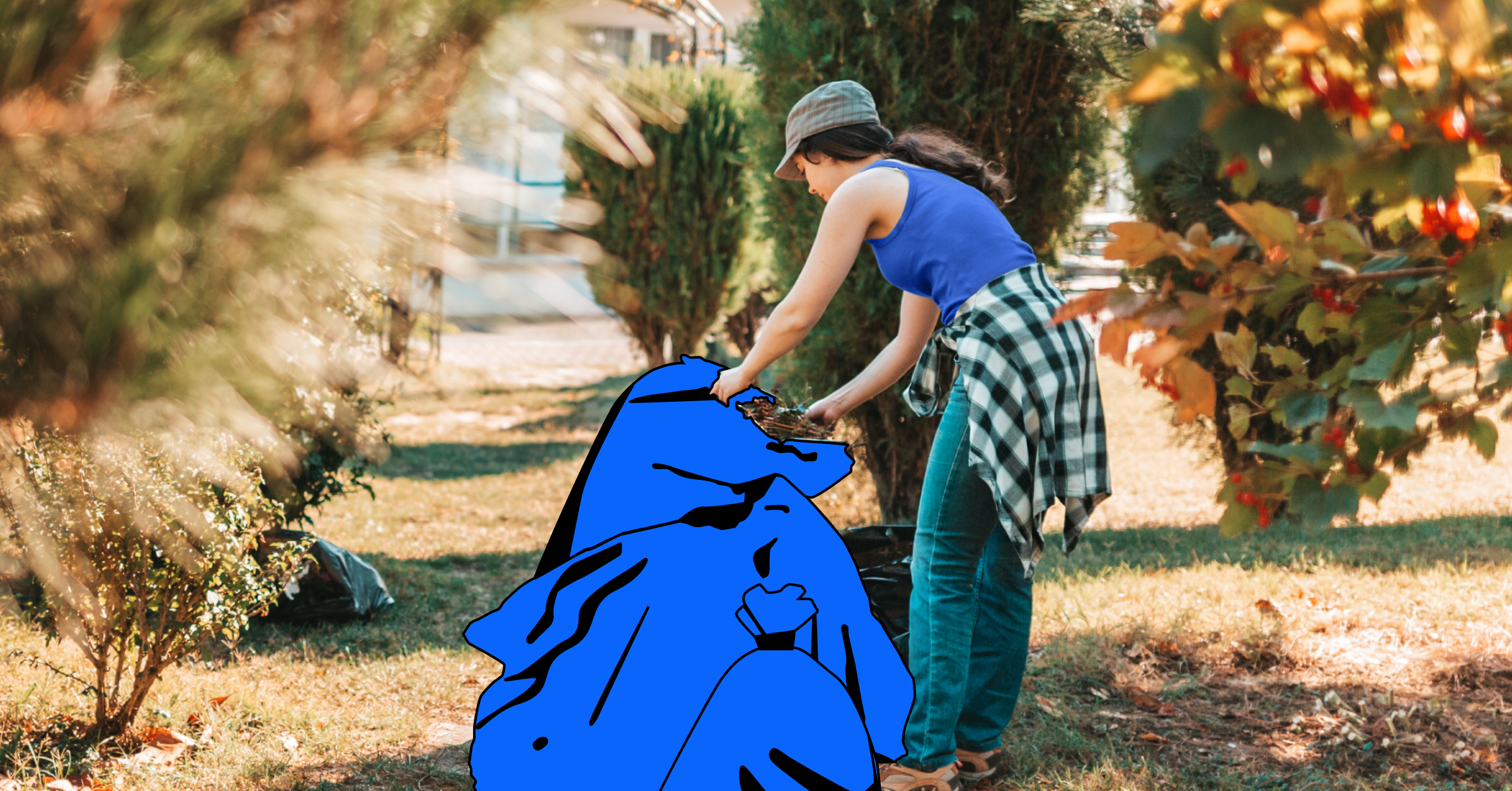 "Worker collecting green waste into a recycling bin for eco-friendly disposal."