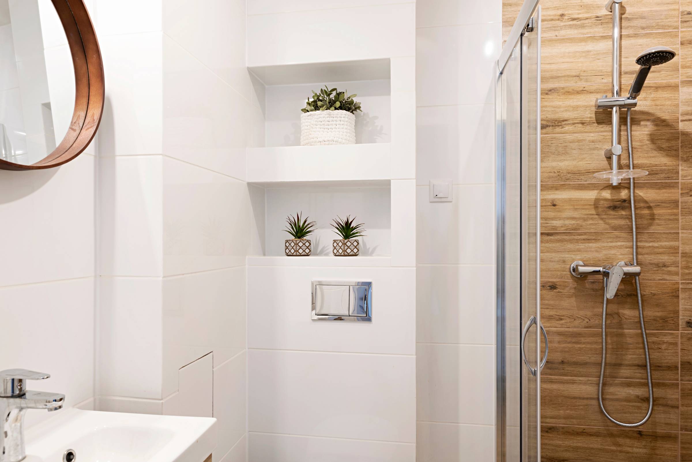 recessed shelving in a small bathroom