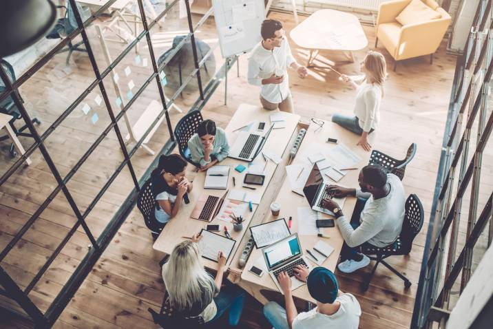 young office workers under moving committee