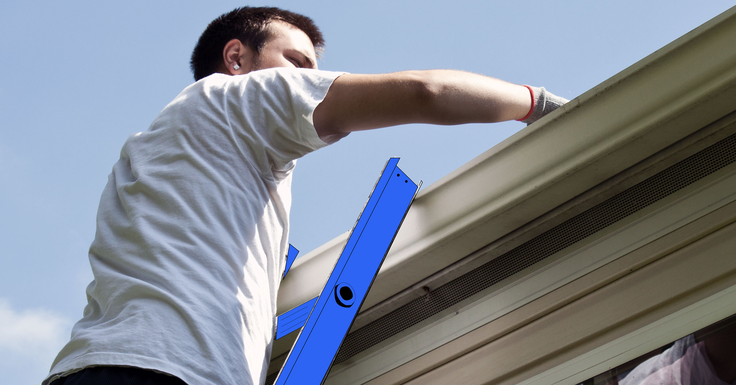 A photo of a professional builder on a ladder, installing a house gutter