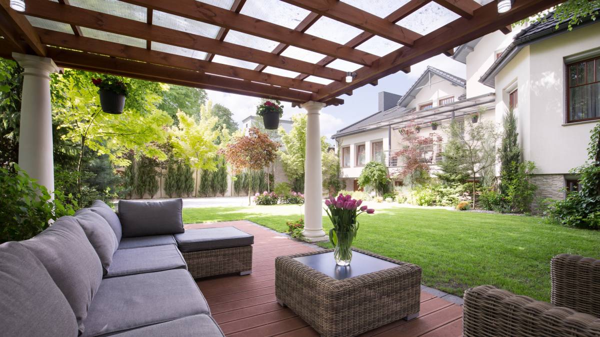 grey lounge area in a covered outdoor deck