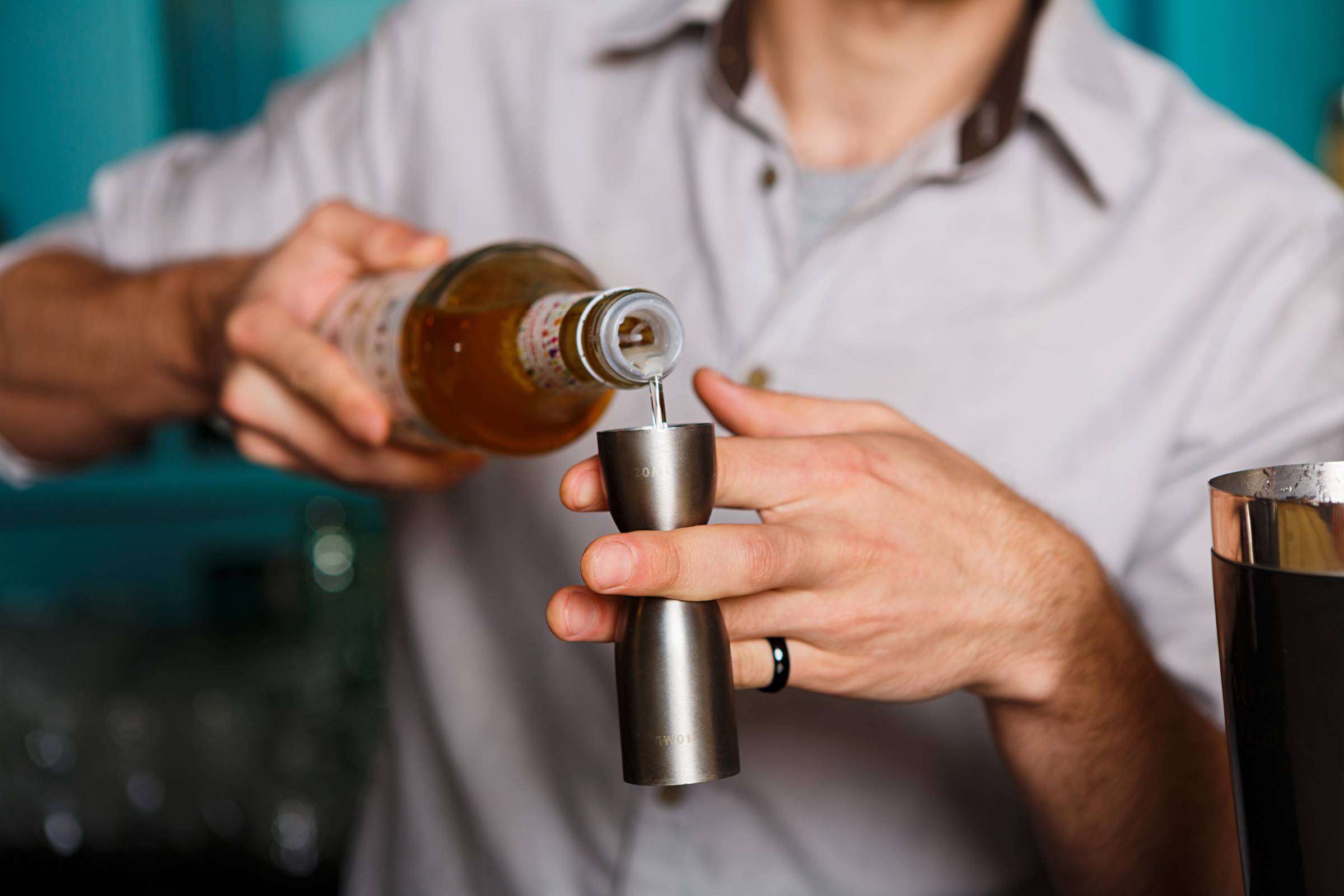 a bartender making a cocktail