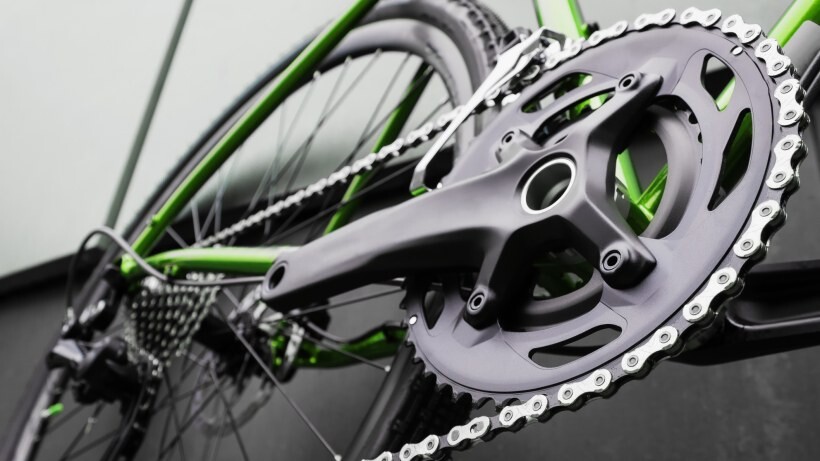 a close-up of the crankset of a new bike to compare the difference between gravel bike vs road bike in terms of gearing