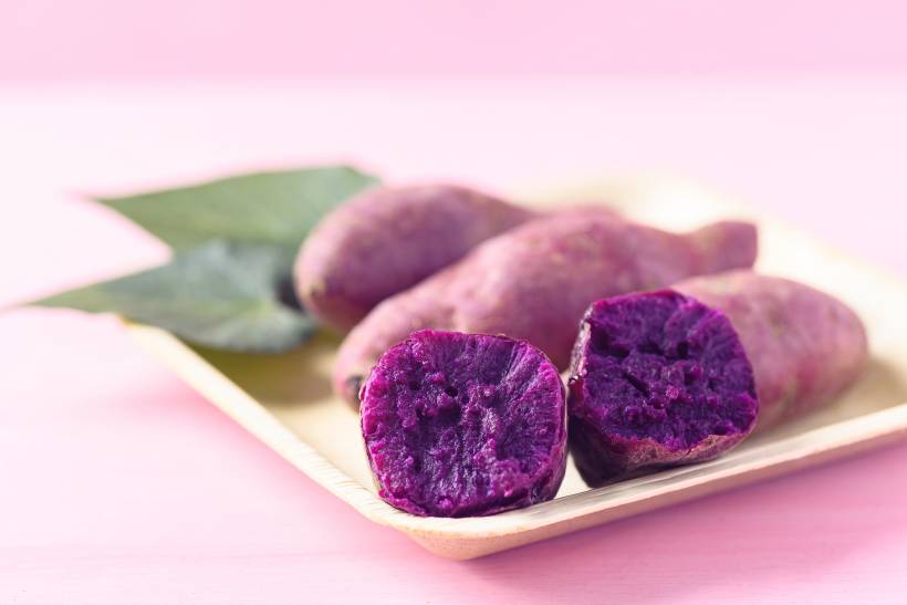 ube vs taro - fresh ube on a plate