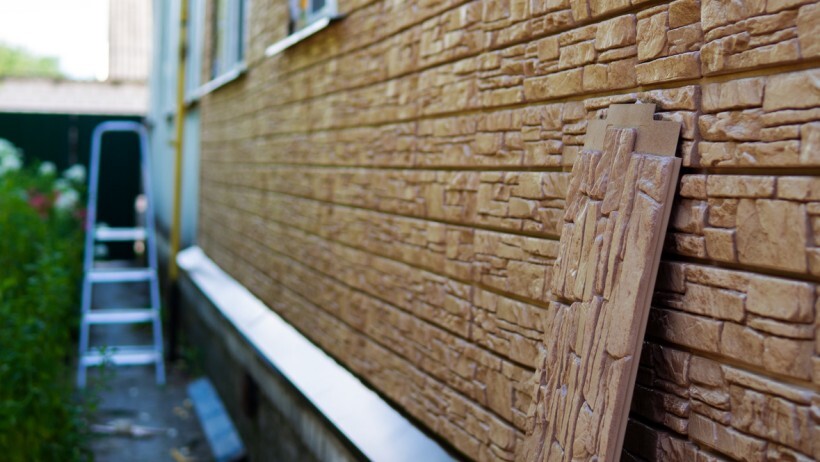 Wall cladding vs wall panelling - Exterior wall showing exposed wooden cladding