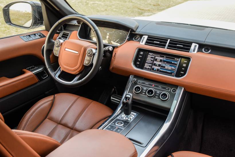 estate vs SUV - the brown leather interior of a Land Rover SUV