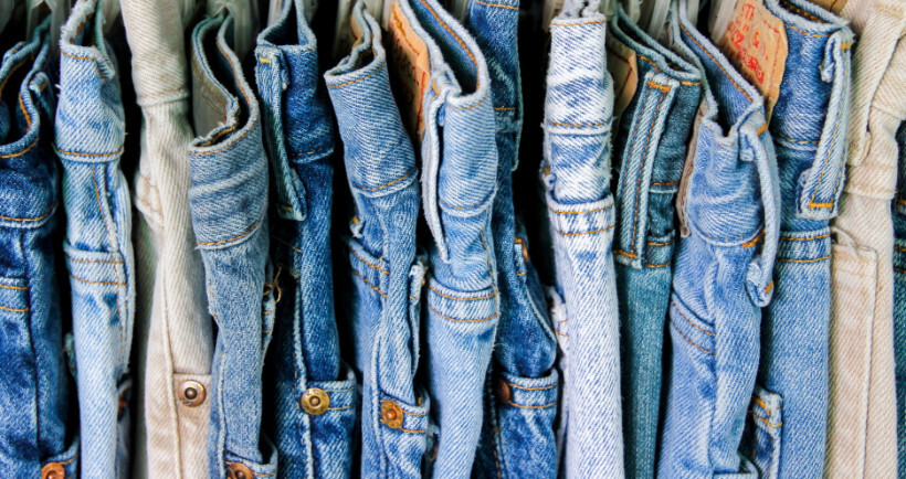 slim vs skinny jeans - Display of thick jeans on a clothing rack