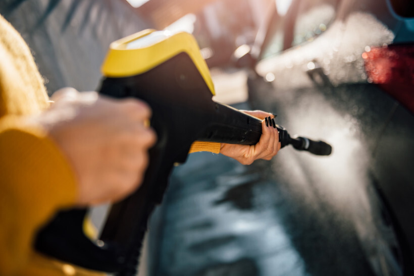 power washer vs pressure washer - Portable washer used on a car