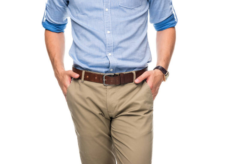 Chinos vs Khakis - Man wearing smart casual chinos paired with a light blue shirt.