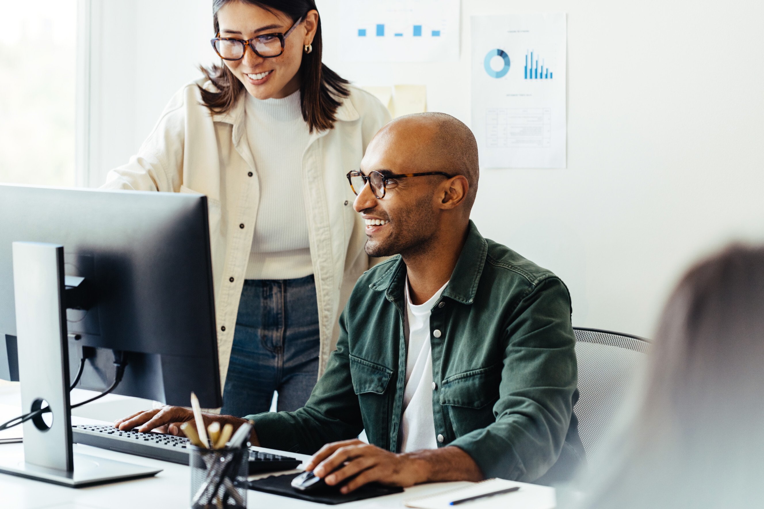 An email setup expert helping a customer configure email on a computer, highlighting professional email setup services near you.