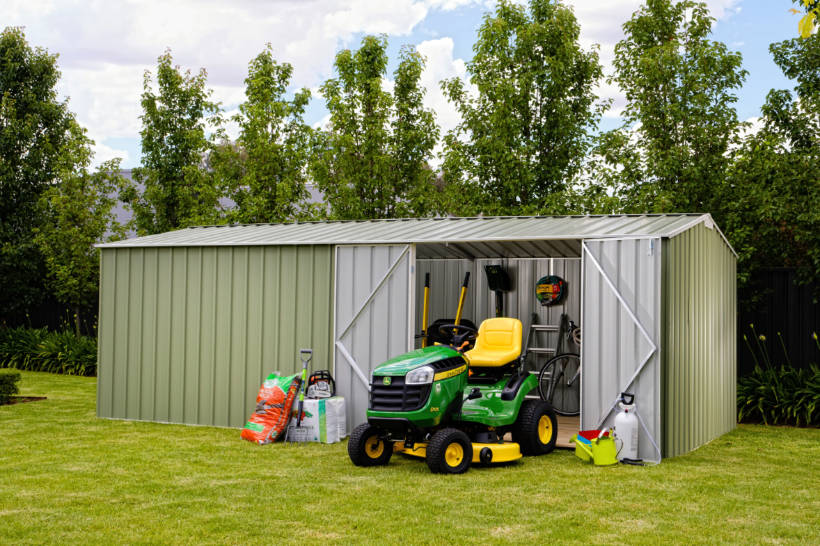 metal vs wood shed - durable Easyshed storage solution housing gardening tools and outdoor essentials in a spacious backyard