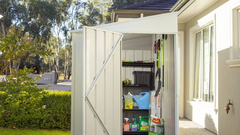 Skillion roof shed by EasyShed, neatly organised with gardening tools