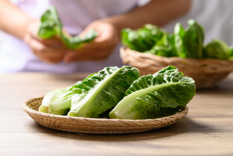 Iceberg lettuce vs romaine - Fresh romaine lettuce in wicker baskets