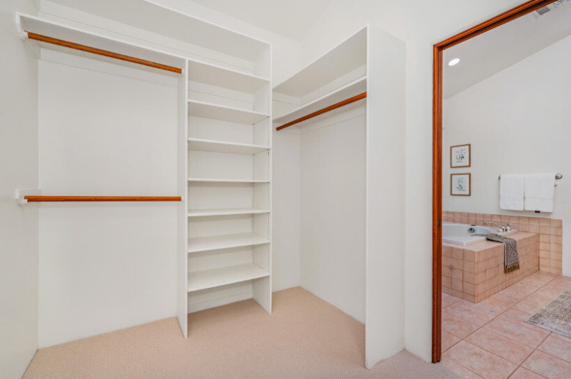 built-in wardrobes cost - Corner built-in wardrobe maximizing bedroom corner space