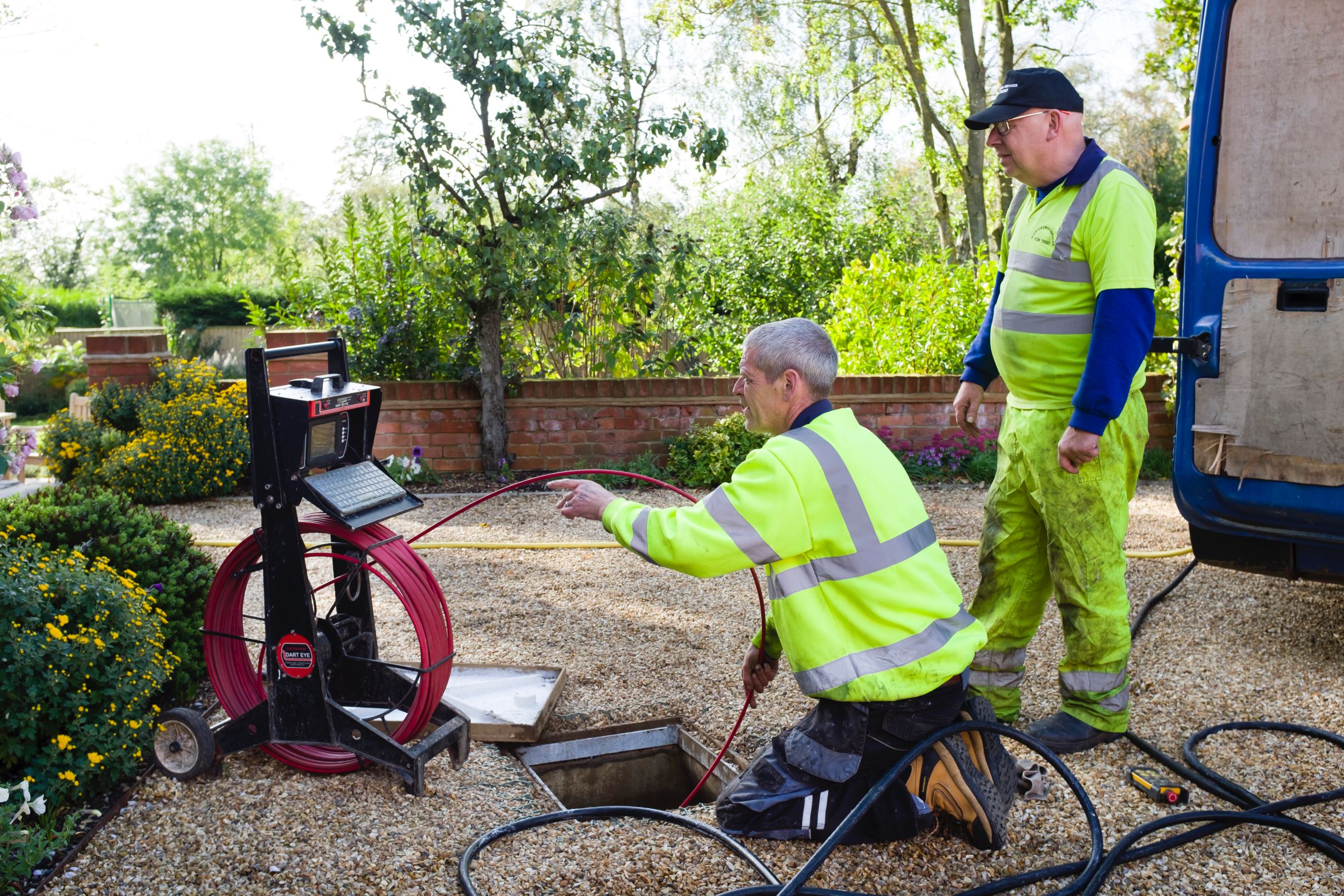 A drain cleaning company checks a blocked drain with a camera prior to jetting signifying Roto-Rooter near me.