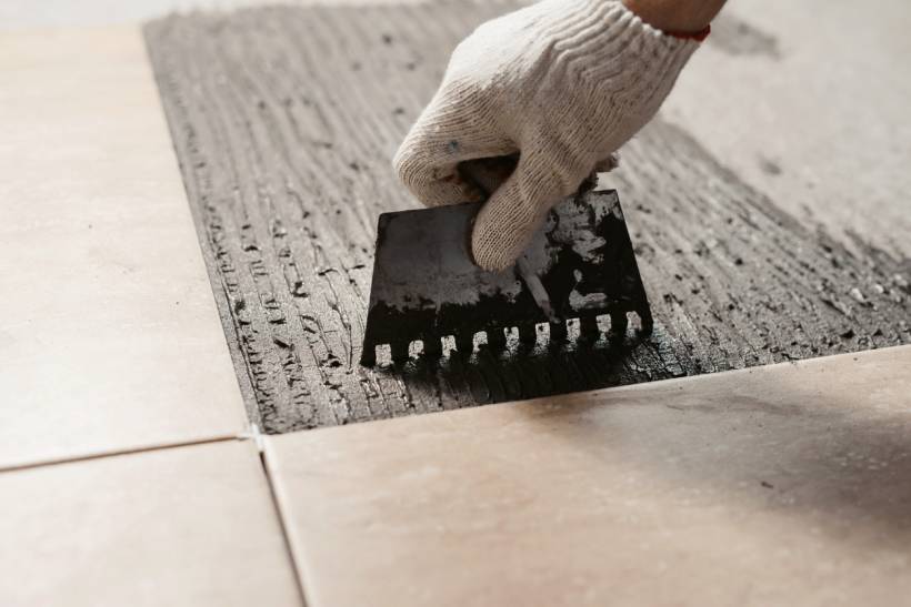 cost to install tile floor - a professional laying tile flooring