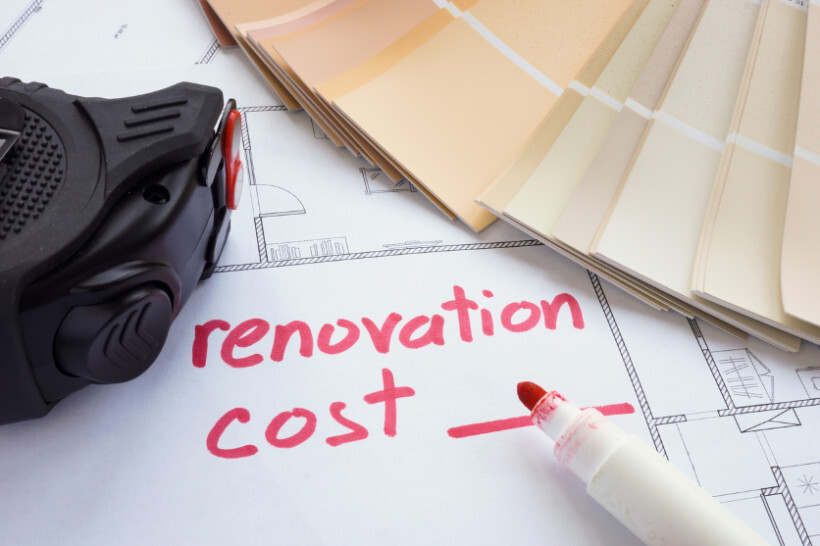 IKEA kitchen cost - A renovation plan with "renovation cost" written in red marker beside a measuring tape and colour swatches