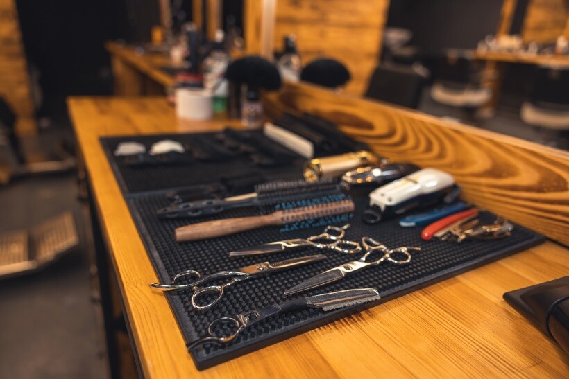 barber vs hairdresser - Close-up of barbershop tools used for cutting and styling hair.